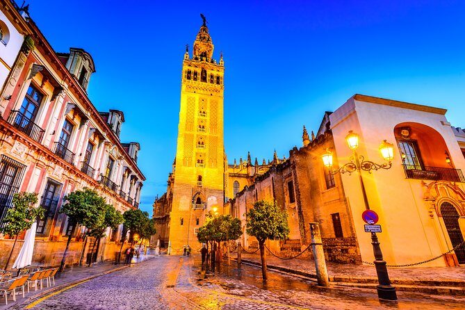 Seville: Cathedral & Giralda Guided Tour with Tickets - Giralda Tower: From Old Minaret to Your Best City Views