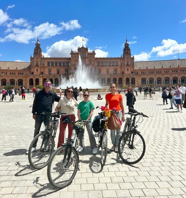 Seville: Dutch Cycling Highlights Tour with local guide - Torre del Oro and San Telmo Palace: stories from the river side