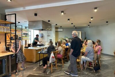 Seville: Paella Showcooking Experience - Your first taste in Seville: local wines and Andalusian snacks