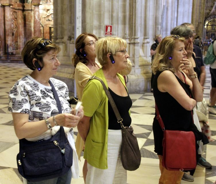 Seville: Royal Alcazar, Cathedral and Giralda Tower Tour - Seville Cathedral: the great hollow mountain, Murillo, and Columbus