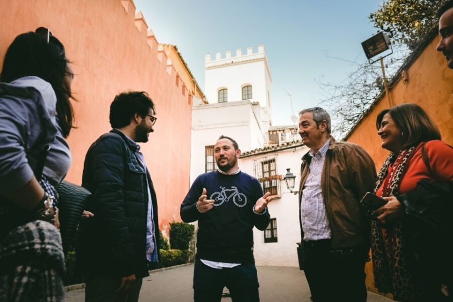 Seville: Small-Group Jewish Quarter Discovery Walking Tour - Plaza del Triunfo → Patio de Banderas: the story gets grounded fast