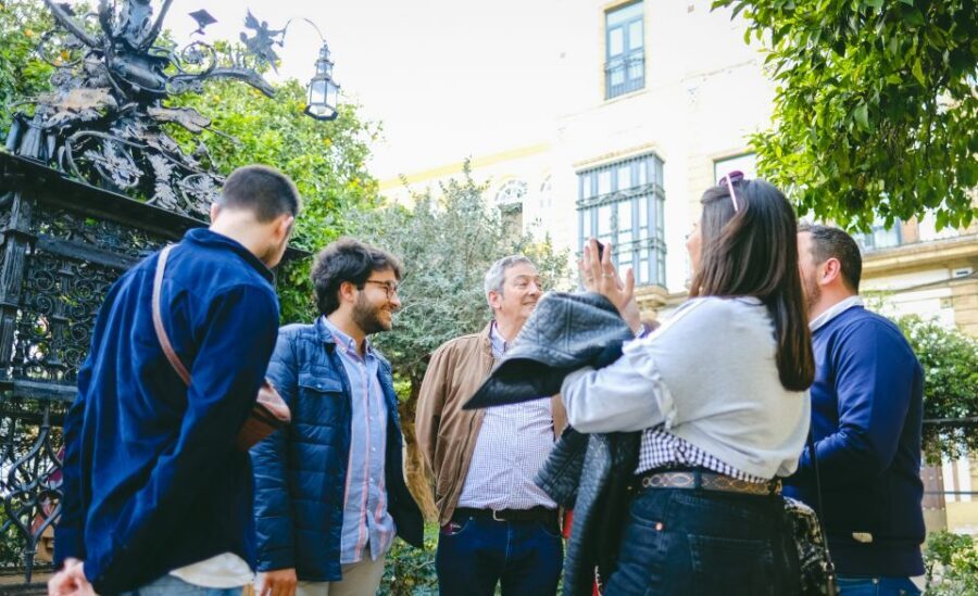 Seville: Small Group Jewish Quarter Tour with Tapas & Drinks - Santa Cruz Square and Jardines de Murillo: swapping crowds for gardens