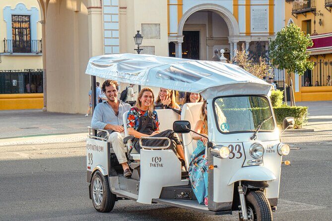 Tour Welcome Seville with Local Guide in Eco Tuk Tuk Private - Plaza de España and the Expo look: classic Seville in one frame